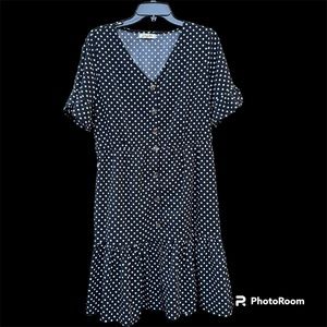 Black & white polka dot‎ dress, size medium has a tie around the waist